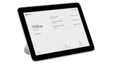 A front-facing image of the Poly TC8 touch controller which is angled to one side.
