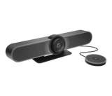 An image of the Logitech MeetUp Expansion Mic to the right of the Logitech MeetUp camera. The two devices are connected by cable.